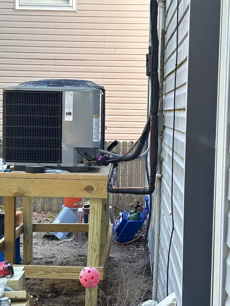 Residential outdoor heat pump equipment during service