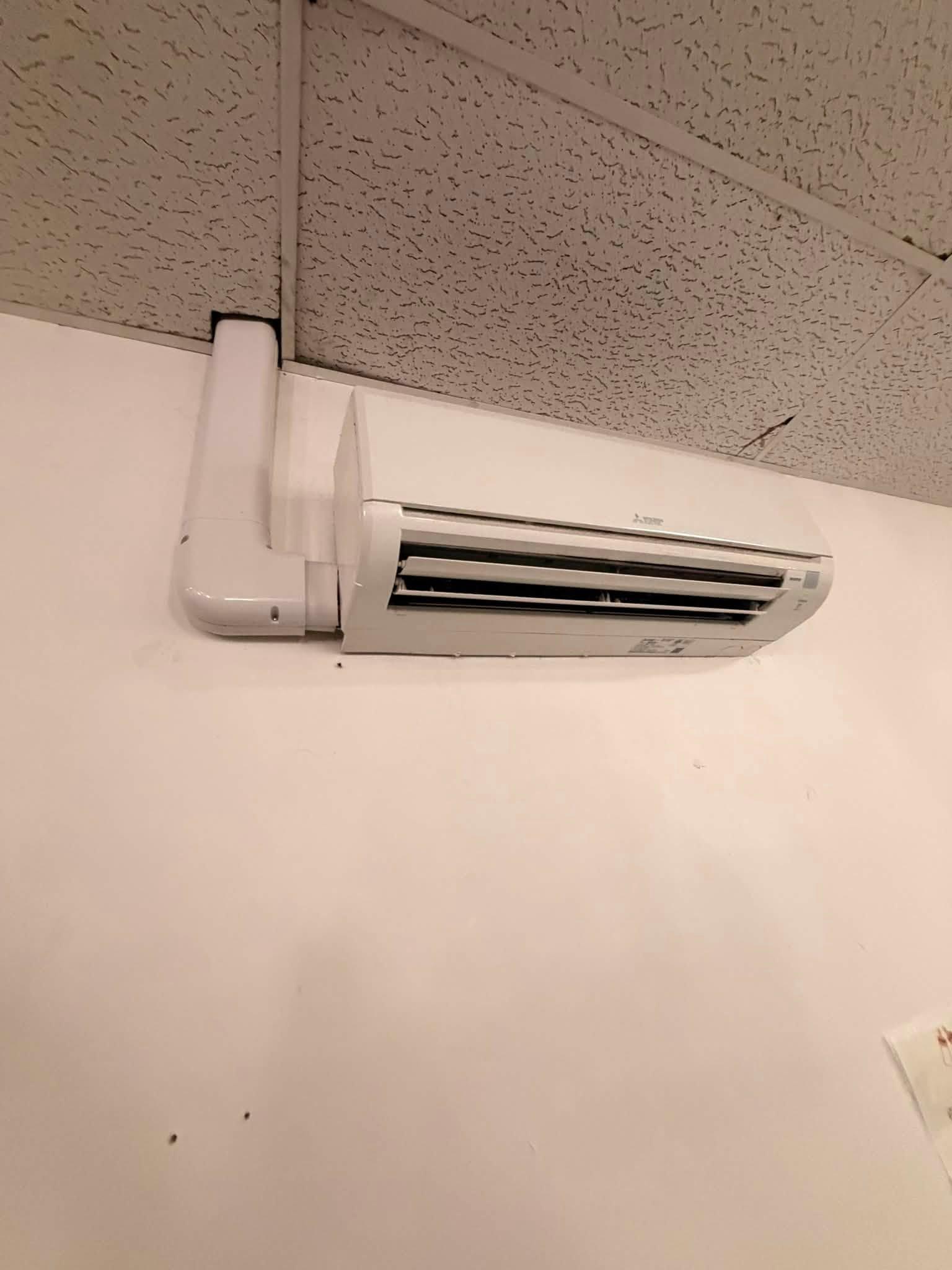 Wall-mounted ductless HVAC unit supporting indoor airflow and comfort