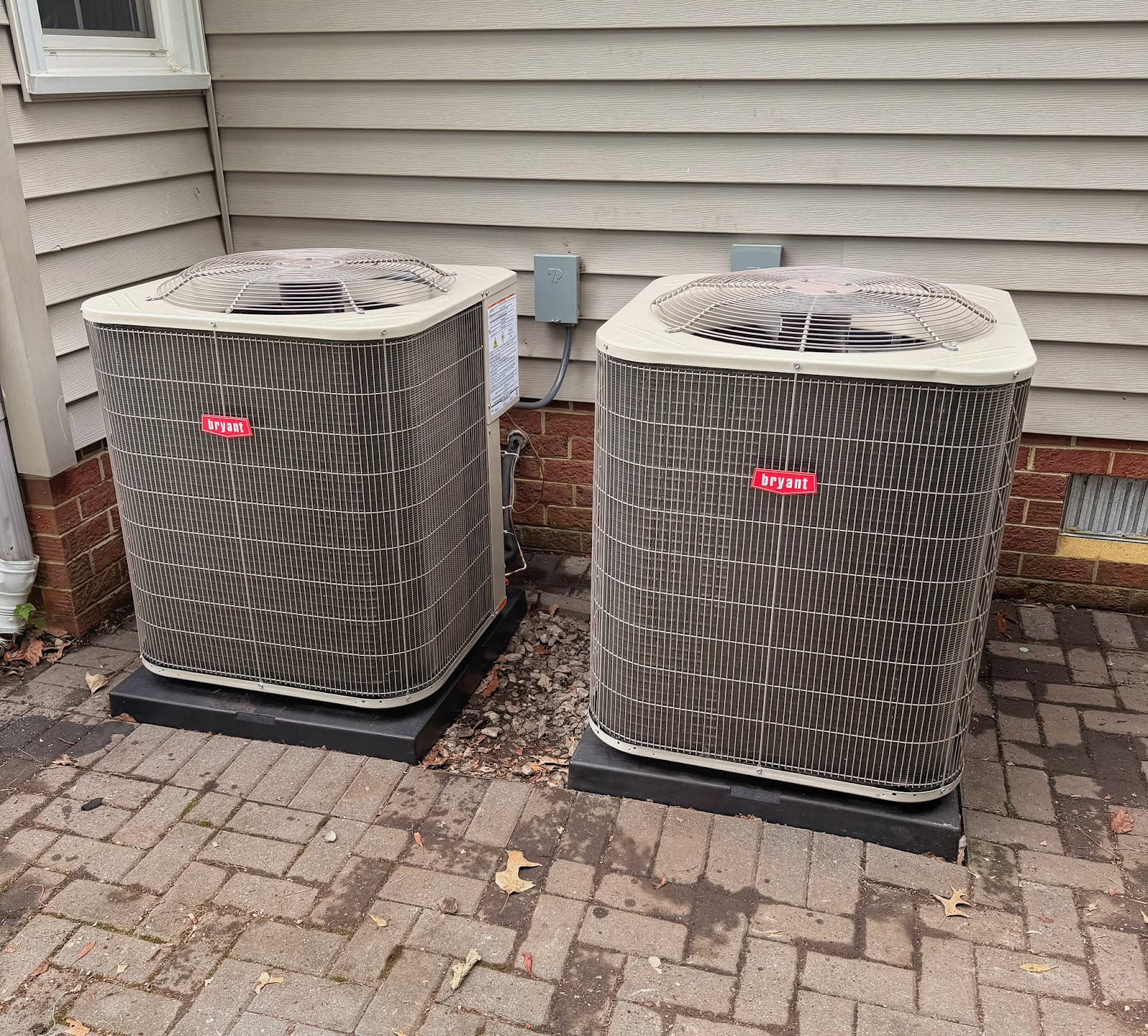 Two outdoor residential HVAC units