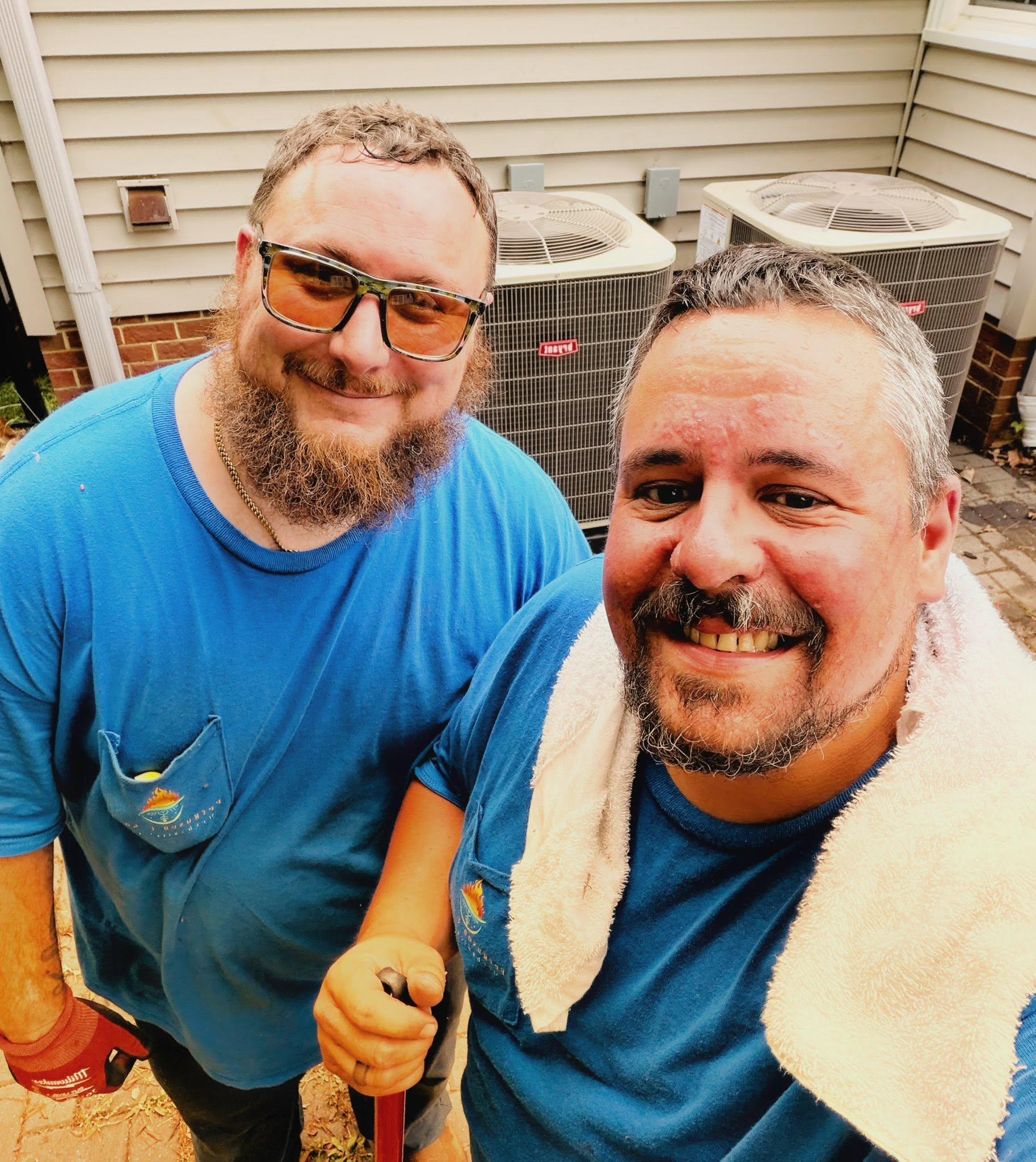 Ferguson & Sons technicians together on the job